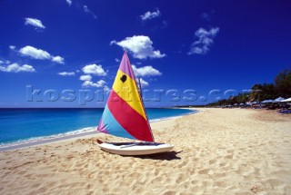 St Maarten - Travel Sailing dinghy on sandy beach