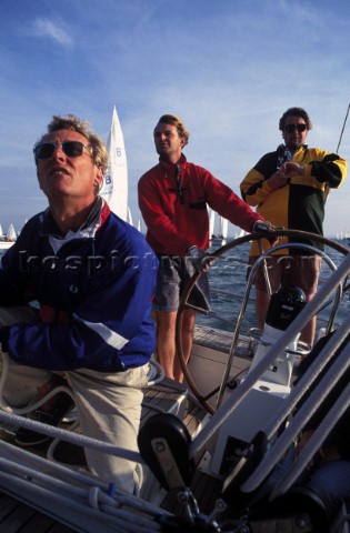 Helmsman and two crew on board Swan 51 Formosa during The Round the Island Race Solent UK