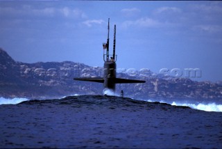 A US Navy submarine dives below the water