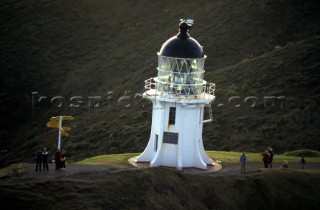 Lighthouse on top of grassy hill, New Zealand