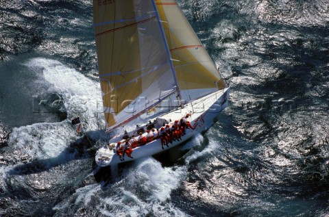 Aerial view of racing yacht Oracle in rough seas during the 1991 Admirals Cup