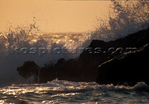 Surf breaking on rocks Island of Kos Greece