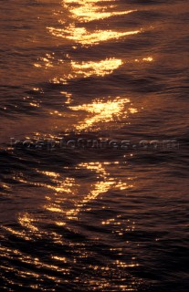 Sunlight reflected on rippled water