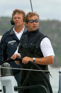 Sydney - Australia  Rolex Sydney Hobart Race 2002. 26 12 2002 Nicorette skipper Ludde Ingvall with the helsman Andy McGow.