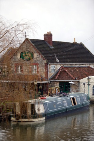 Canal boat moored outside public house pub  Canal boats on English Kennet and Avon Canals
