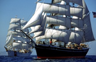 The Star of India and the US Coast Guards Eagle sail together off Point Loma, California outside of San Diego.