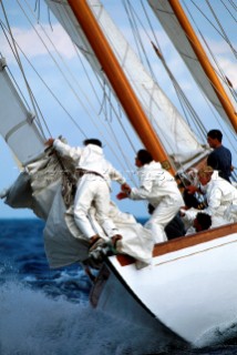 Crew struggle with the sails on a classic yacht