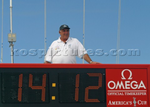 Americas Cup race officer Harald Bennett checks for breeze during race five the Americas Cup in Auck