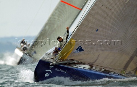 Amerikcas Oneworld Challenge bowman Alan Smith perpare to set the spinnaker as they lead Team Dennis