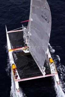 Maxi Cat Cheyenne owned by American Steve Fossett crosses the Finish after a record round the world non-stop voyage of 58 days, 9 hours, 32 minutes and 45 seconds.