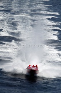Aerial view of Powerboat P1 competitor skimming across water in Malta 2004