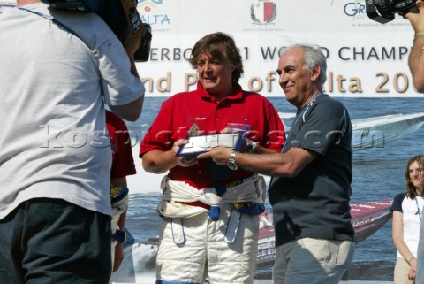 30504 President of Grimaldi Ferrries presents his trophy to the top boat Thuraya