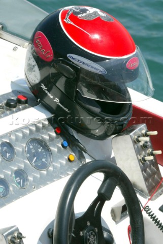 METAMECCANICAHelmet of driver Marco Pennesi resting on boats dashboard