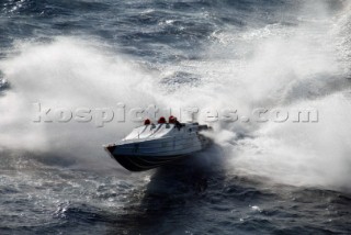 A powerboat crashes through a wave during the Powerboat P1 World Championship, Malta