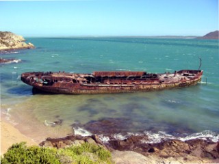 Rusty wreck of a ship on the coast of South Africa