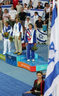 Athens 25 08 2004. Olympic Games 2004  . Mistral M. GAL FRIDMAN (ISR) Gold. NIKOLAOS KAKLAMANAKIS (GRE) Silver. NICK DEMPSEY (GBR) Bronze.