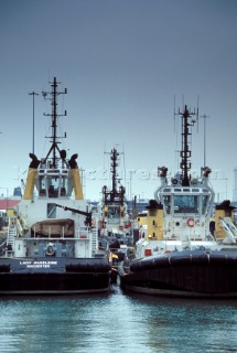 Tugboats moored at Southampton docks, UK