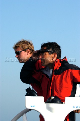 Cheyenne Skipper David Scully navigator Wouter Verbraak looking out to sea on watch