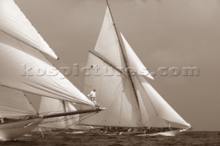 Two classic yachts racing with bowman on bowsprit