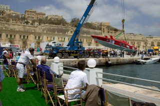 P1 Malta 2005. Crance lifting powerboat to launch.