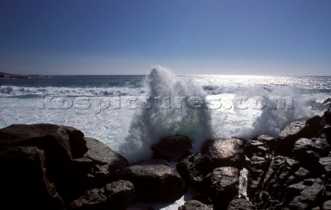Wave crashing over rocks at Llundudno Cape Town South Africa