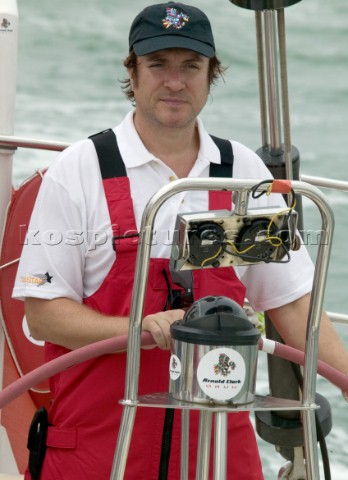 Duran Duran star Simon Le Bon at the helm of maxi yacht Arnold Clarke Drum at the start of the Rolex