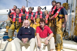Rockstar Simon Le Bon of Duran Duran and his crew on Arnold Clark Drum, with RNLI volunteer Vivian Percival who rescued the crew onboard Drum when the maxi yacht capsized 20 years ago during the l985 Fastnet Race.