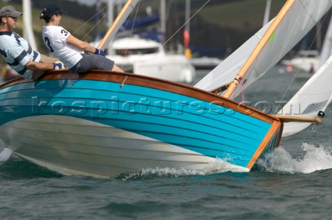 Blue classic yawl racing in Dartmouth UK
