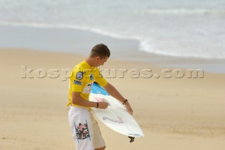 Competitor waxing his board at the Rip Curl Championship 2005