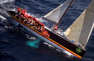 Aerial view of crew on rail of maxi yacht Black Dragon