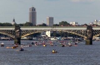 Rowing boats from around Europe compete in the Great River Race down the Thames in London, UK