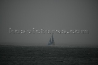 The Volvo Ocean Race fleet head head out to sea at the start of leg one from Vigo, Spain. BRAZIL under dark sky in stormy conditions