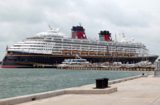 Holiday cruise ship Disney Magic moored in port in Key West, Florida, USA showing her numerous lifeboats and decks. Key West