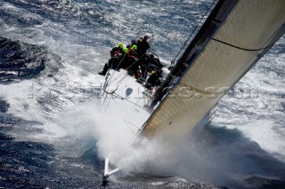 Konica Minolta sailing along the Tasmanian coast, Australia, Dec. 28, 2005. 85 yachts of all sizes battled for this years line honors in this the 61st running of the world famous race.