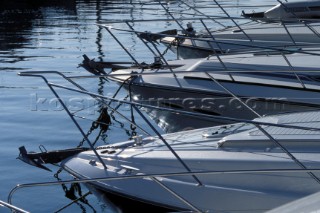 Bows of motor boats moored in Monaco Harbour