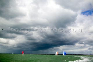 COWES, ENGLAND - AUGUST 1: Stormy skies accompany the gusty squalls during Day 4  of Skandia Life Cowes Week 2006. (Photo by Kos/Kos Picture Source via Getty Images)