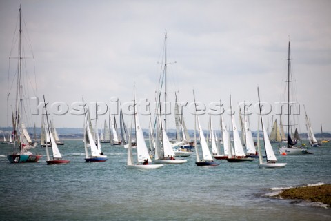 COWES ENGLAND  JULY 29 Sailors in the classic Daring Class short tack along the shoreline during Day
