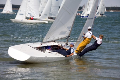 COWES ENGLAND  JULY 29 The crew of the International Etchells Class yacht Freelance lean out on the 