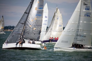 COWES, ENGLAND - JULY 29: Sailors in the fast Sportsboat Class short tack along the shoreline during Day 1 of Skandia Life Cowes Week 2006. (Photo by Kos/Kos Picture Source via Getty Images)