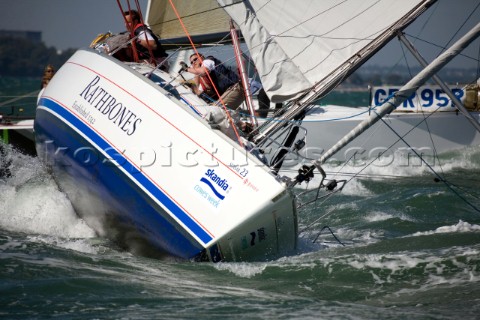 COWES ENGLAND  JULY30 Sailors onboard the yacht Sunsail 23 struggle to control the yacht in a leewar