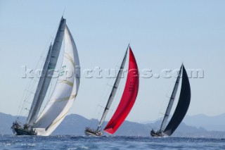 PORTO CERVO, SARDINIA - SEPT 6th 2006: The Wally maxi yacht Tango (MON) owned by©Carlo Sama (black spinnaker right) leads Andrea Recordatis (ITA) Wally yacht Indio (red spinnaker) and Morten Sig. Bergsens (NOR) Wally maxi Nariida (left) reaching under asymmetric spinnaker at the Maxi Yacht Rolex Cup 2006 in Porto Cervo, Sardinia. (Photo by Tim Wright/Kos Picture Source via Getty Images)