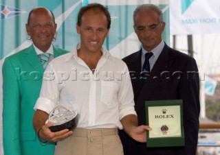 Porto Cervo, 08 09 2006. Maxi Yacht Rolex Cup 2006. Prizegiving Roma, Filippo Faruffini, Owner Roma, Ing Baiocchi Vicepresident YCCS.