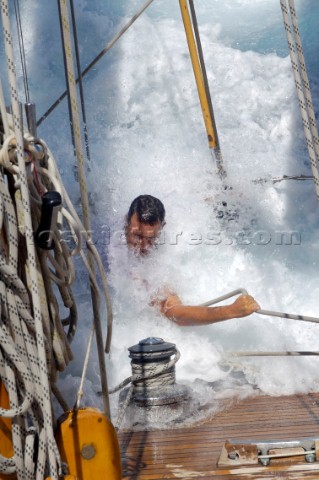 Antigua Classic Yacht Regatta April 2006 Part of sequence of crew member on Aschanti IV working on l