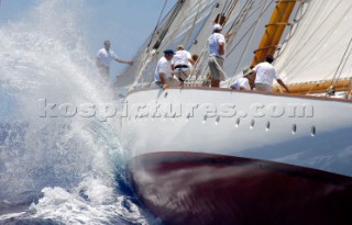 Antigua Classic Yacht Regatta April 2006. One of sequence of five pictures of bowman standing at end of bowsprit directing operations on a large boat