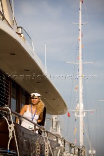 Girl crew onboard a superyacht wearing a sailors uniform and outfit