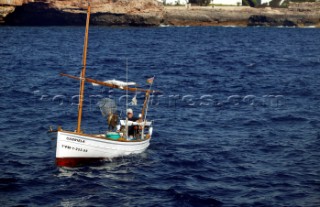 Fisherman on a small fishing boat