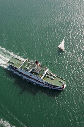 Aerial shot of Red Funnel vehicle and passenger ferry travelling between East Cowes and Southampton 