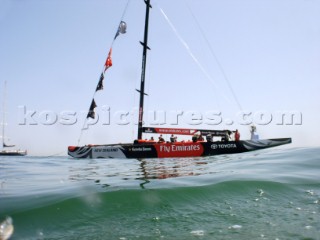 Emirates Team New Zealand NZL92 drifts around the southern race course waiting for wind that never comes on day two of the Louis Vuitton Cup. 17/4/2007