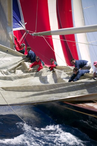 PALMA MAJORCA  JUNE 19TH  The foredeck crew crew drop the sails on the JClass Ranger sailing on New 