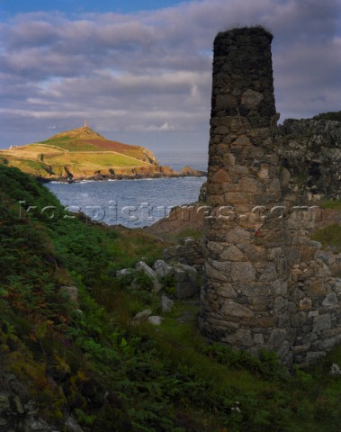 Sunlight on the north side of Cape Conwall viewed from tin mine ruins Although the ruins are in shad